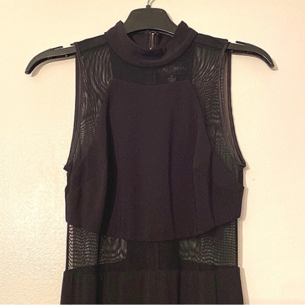 Betsy & Adam Sleeveless Black Evening Gown with Sheer Panels